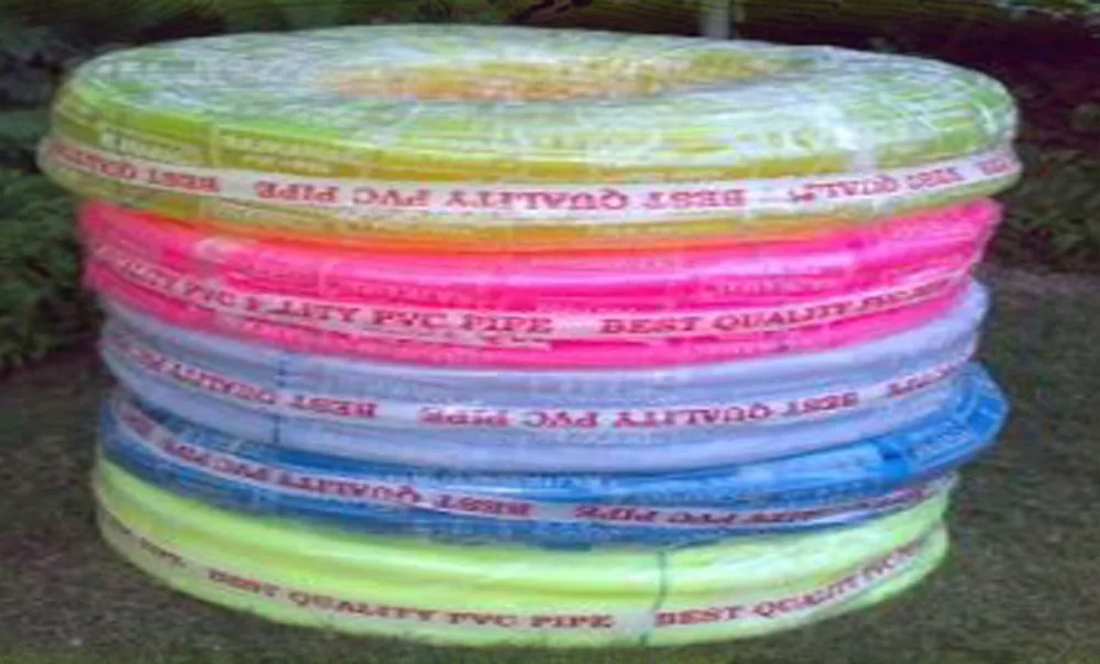 Coils of colourful Rajkamal PVC flexible pipes stacked together