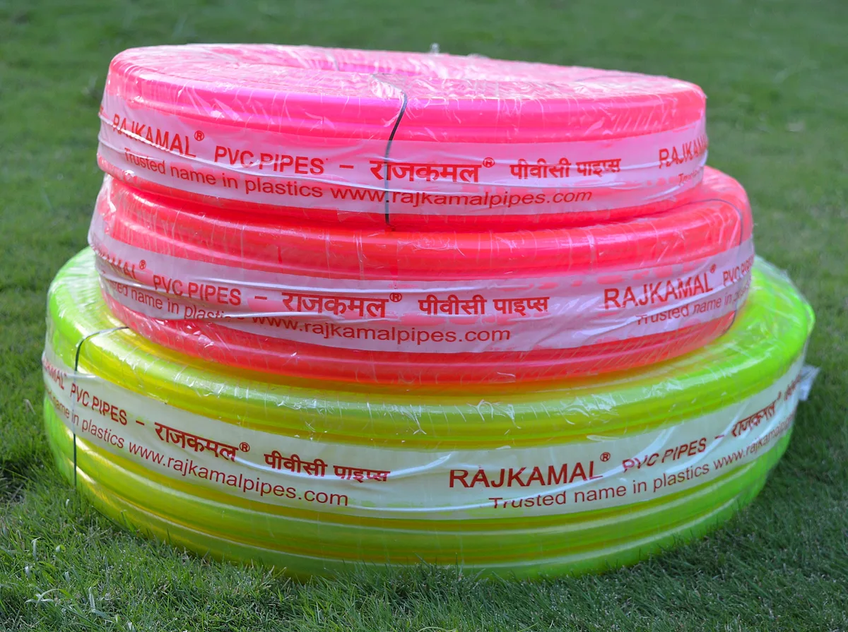 Pink and green Rajkamal colour transparent garden pipe coils